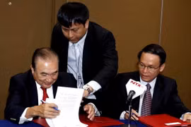 El Director General de la Agencia Vietnamita de Noticias (VNA), Nguyen Duc Loi, y su homólogo de la Agencia de Noticias del Estado Mexicano (NOTIMEX), Alejandro Ramos Esquivel (Fuente: VNA)