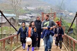 Turistas internacionales en Sapa (Fuente:VNA)