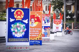 Se instalan paneles, banderas y pancartas con lemas para promocionar las elecciones de diputados a la Asamblea Nacional de la XV legislatura y los Consejos Populares en todos los niveles para la etapa 2021-2026 (Fuente: VNA)