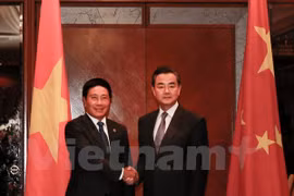 Los cancilleres de Vietnam, Pham Binh Minh, y China, Wang Yi (Fuente: VNA)