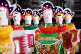Muñeco de papel, juguete tradicional del Festival de Medio Otoño