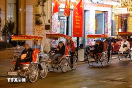 Turistas en Hanoi. (Fuente: VNA)