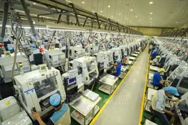 (Televisión) Empresas de inversión extranjera en Vietnam reanudan actividades 