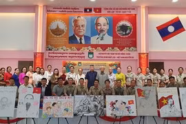 Escuela en Laos rinde homenaje al Presidente Ho Chi Minh. (Fuente:VNA)