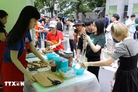 Un festival cultural en la ciudad de Uijeongbu de la provincia surcoreana de Gyeonggi se celebró para conmemorar el décimo aniversario de la Asociación de Mujeres de Vietnam (Fuente: VNA) 