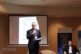 Intensifica Vietnam y provincia canadiense cooperación en industria auxiliar