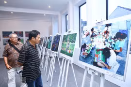 Honran fotógrafos nacionales y extranjeros la belleza de Hanoi 