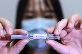 China dispuesta a cooperar con ASEAN en desarrollo de vacuna contra el coronavirus