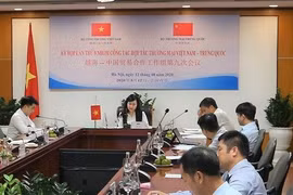 Debaten medidas para impulsar cooperación comercial Vietnam-China