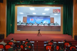Medicina militar de Vietnam y China comparten experiencias en control del COVID-19