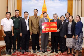 Apoyan vietnamitas mitigación de consecuencias de inundaciones en Laos 