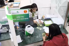 Bancos comerciales vietnamitas respaldan a empresas afectadas por COVID- 19
