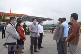 Provincias vietnamitas y laosianas mejoran coordinación en lucha contra el COVID-19