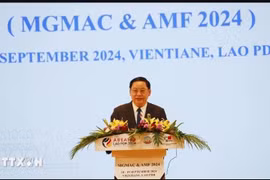 El primer ministro de Laos, Sonexay Siphandone, en el evento (Foto: VNA) 