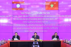 Partidos de Vietnam y Laos realizan VIII seminario teórico