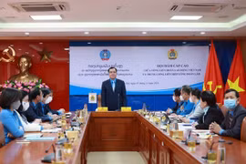 Refuerzan Vietnam y Laos cooperación en actividades sindicales