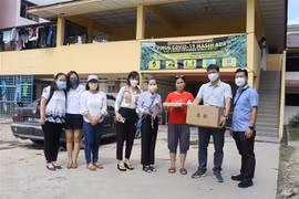 Prestan atención a vietnamitas afectados por inundaciones en Malasia