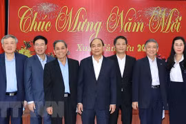 Premier vietnamita felicita a exdirigentes del Partido y Estado en ocasión del Tet