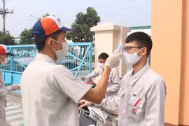 Exigen evitar propagación de COVID-19 en zonas industriales de Vietnam