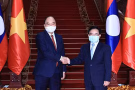 Visita oficial del presidente vietnamita a Laos refleja gran amistad y solidaridad bilateral