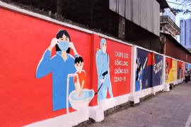 Lanzan en Hanoi proyecto de murales de propaganda sobre lucha contra COVID-19