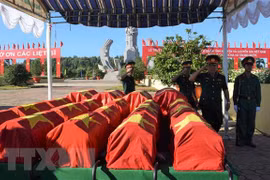 Rinden homenaje póstumo a combatientes vietnamitas fallecidos en Laos