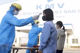 Primer ministro vietnamita insta a garantizar prevención y control del COVID-19 en parques industriales