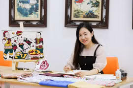 Desarrolla artista vietnamita arte del collage de telas