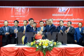  Vietnam y Laos fomentan cooperación en propaganda y educación