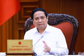 El primer ministro de Vietnam, Pham Minh Chinh, preside la reunión. (Foto: VNA)