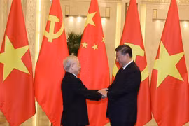 El secretario general del PCV, Nguyen Phu Trong, se reúne con el secretario general del PCCh y presidente de China, Xi Jinping, con motivo de su visita oficial al país vecino del norte en octubre de 2022. (Foto: VNA)