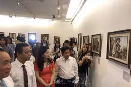 Delegados en la exposición. (Fuente: VNA)