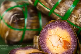 Banh Tet La Cam, tradicional pastel de arroz