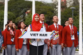 Izada bandera nacional de Vietnam en SEA Games 29 en Malasia