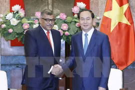 El presidente vietnamita, Tran Dai Quang, y el presidente del Tribunal Supremo de Singapur, Sundaresh Menon 