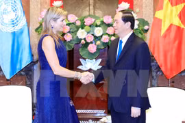 El presidente de Vietnam, Tran Dai Quang, (D) recibe en Hanoi a la Reina de Países Bajos, Máxima Zorreguieta Cerruti