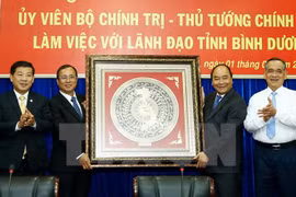 Premier urge a Binh Duong a convertirse en pionero de economía nacional