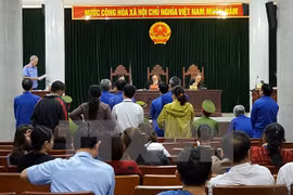 Condenan a prisión en Vietnam a sujetos por fraude millonario 