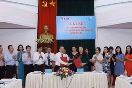 VNA y Unión de Mujeres de Vietnam firman acuerdo de cooperación 
