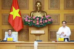 El primer ministro de Vietnam, Pham Minh Chinh, y el presidente de la Asamblea Nacional (Parlamento) del país, Tran Thanh Man, copresiden la cita (Fuente: VNA)
