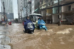 Una calle en Hanoi tras fuertes lluvias. (Foto: VNA)