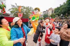 El festival de turismo contribuye a presentar y promover los destinos, productos, servicios y recuerdos turísticos de marca de Hanoi. (Foto: VNA)