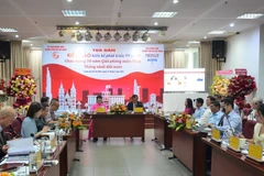 En el seminario titulado "Vietnamitas en el extranjero ofrecen sugerencias para el desarrollo de Ciudad Ho Chi Minh". (Foto: VNA)