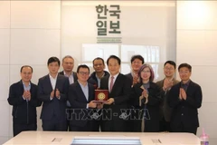 En el encuentro entre la delegación vietnamita y el diario Hankook Ilbo (Fuente: VNA)