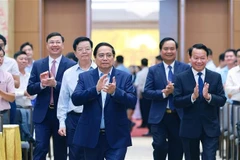 El primer ministro de Vietnam, Pham Minh Chinh, preside la conferencia nacional en línea para revisar el Programa de Objetivos Nacionales sobre la construcción de áreas rurales (Fuente: VNA)