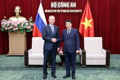 El ministro de Seguridad Pública, general Luong Tam Quang, y el jefe del Consejo Marítimo de la Federación de Rusia, Nikolai Patrushev (Fuente: VNA)