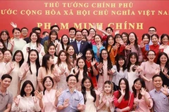 El primer ministro vietnamita, Pham Minh Chinh, sostiene un encuentro con representantes de la comunidad vietnamita en las regiones chinas de Beijing, Tianjin y Hebei (Fuente: VNA)