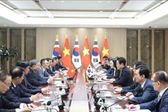El secretario general To Lam se reúne con el presidente surcoreano, Lee Jae Myung. Foto: VNA