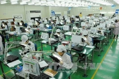 Línea de producción de componentes electrónicos en el Parque Industrial Yen Phong, provincia de Bac Ninh (Foto: VNA)