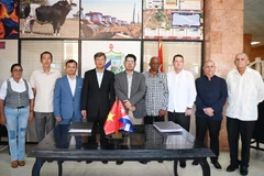 Delegados en la ceremonia de firma (Fuente: VNA)